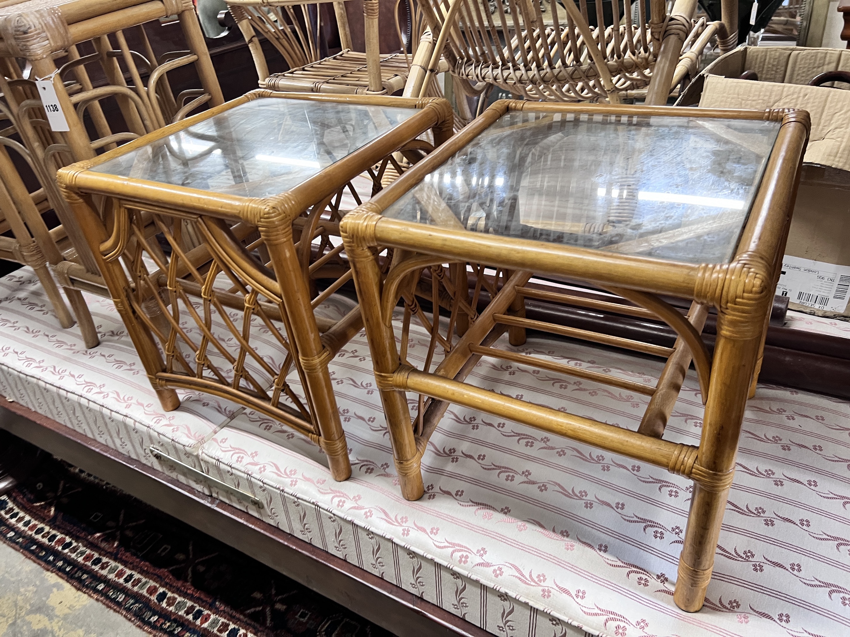 A Franco Albini rocking chair with coffee table, two side tables and a pair of plant stands